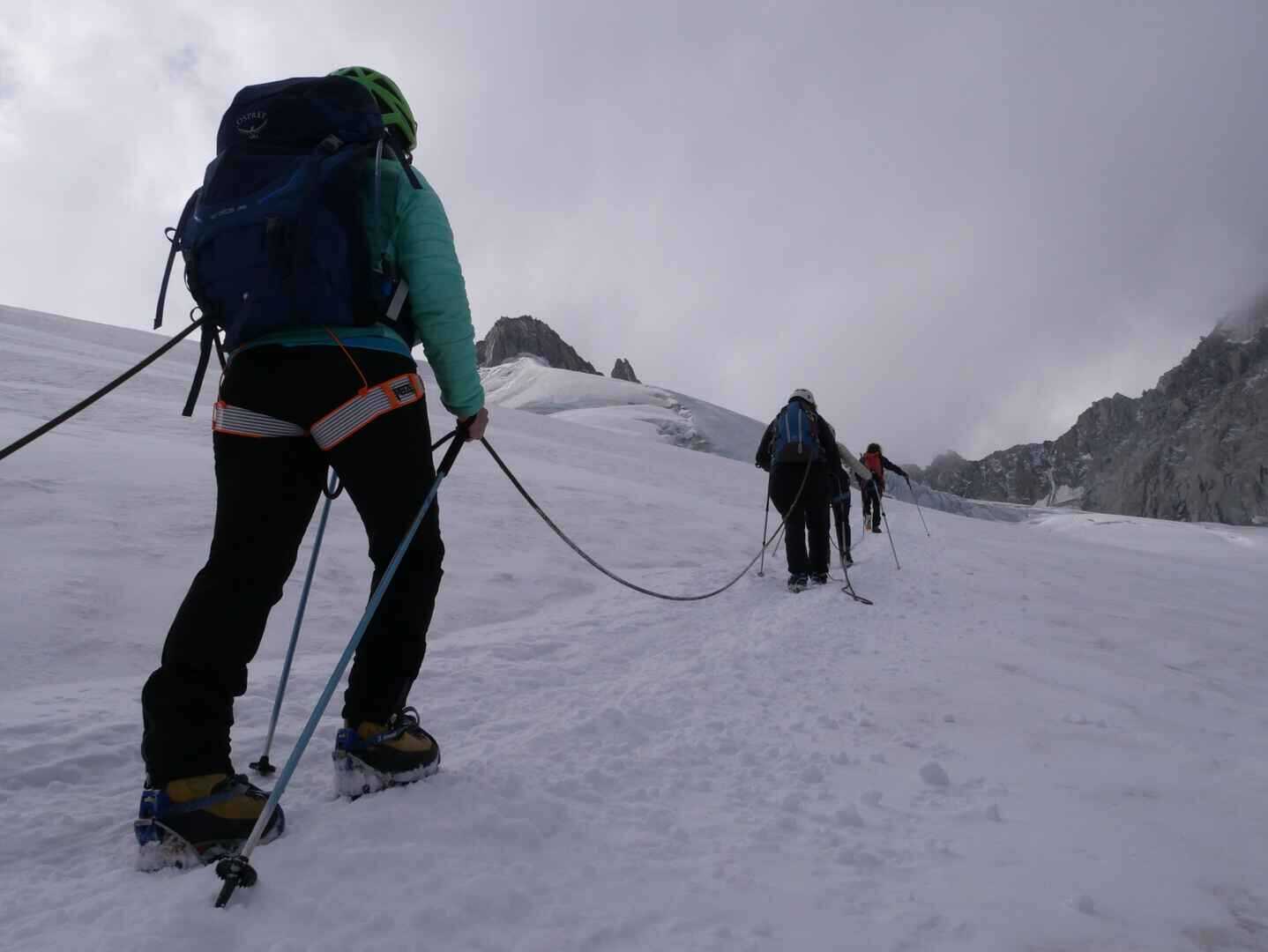 People hiking on a glacier