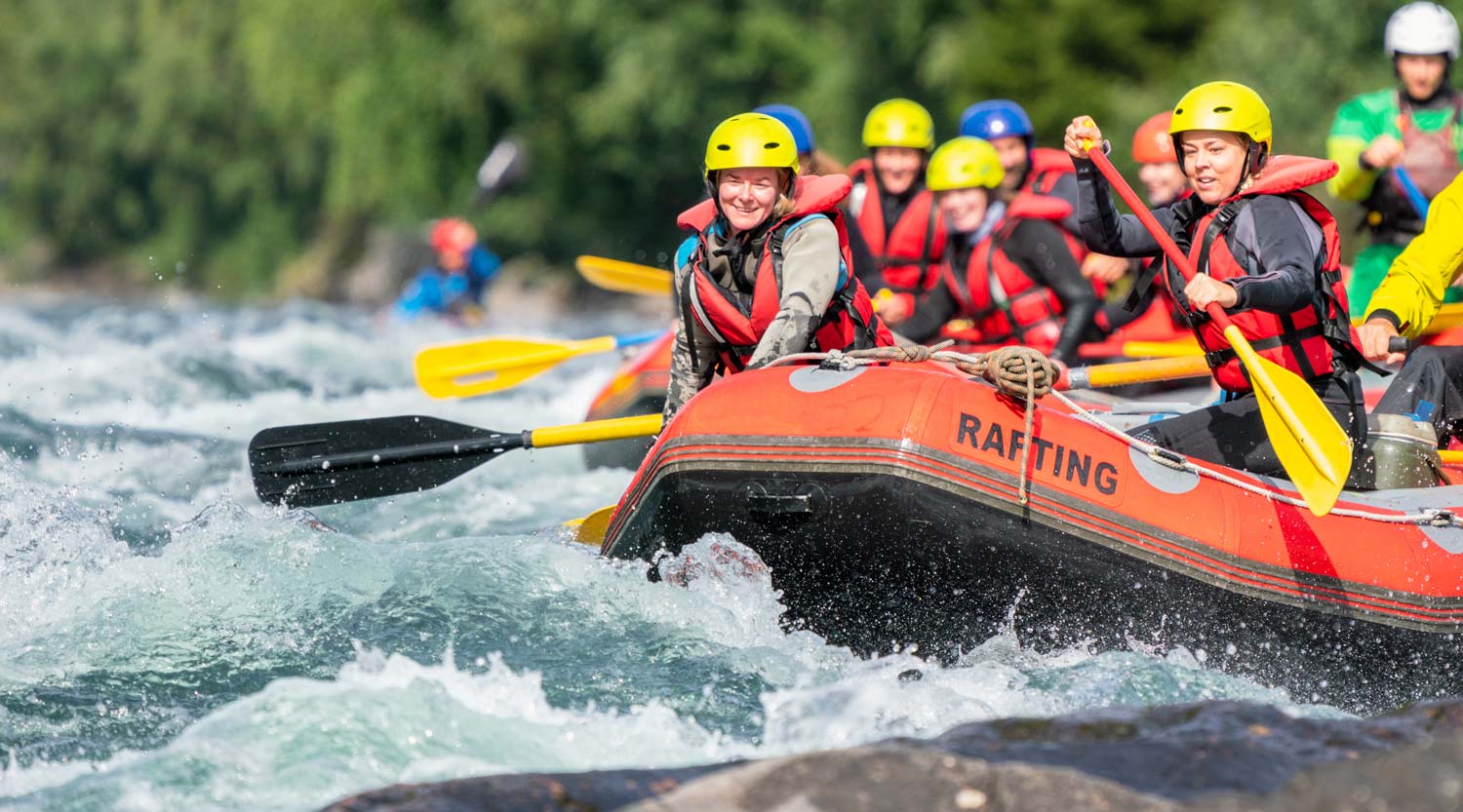 Photo showing people whitewater rafting