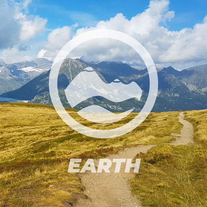 image of mountain view with earth logo on it